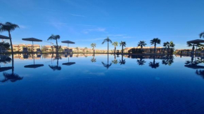 mini-villa situee dans une residence Prestigia à Marrakech, avec une vue sur la piscine et le golf une securite 24h sur 24 et une proximite ideale de l aeroport 5 minutes C est une offre parfaite pour